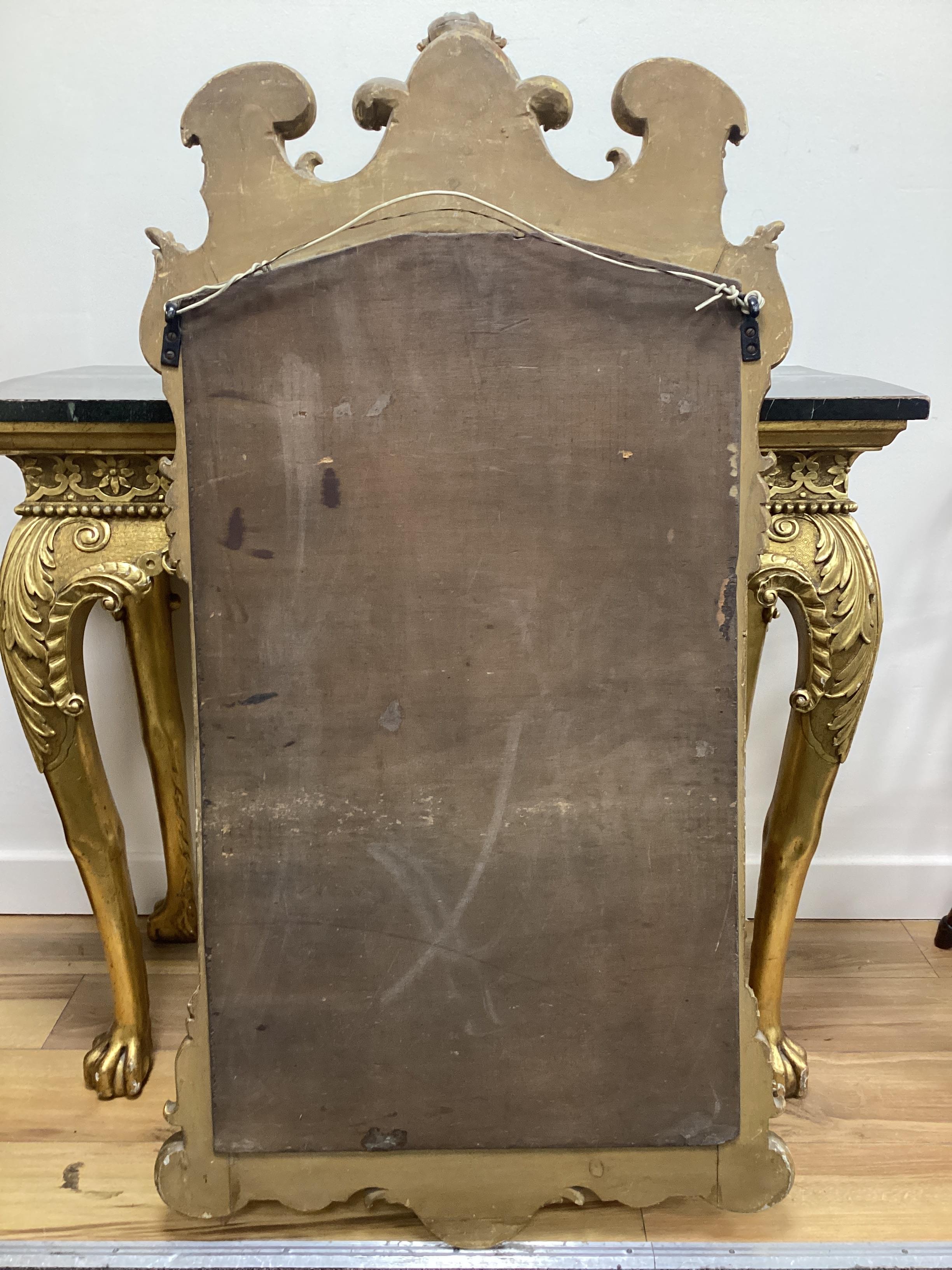 A George II style giltwood pier table, width 91cm, depth 45cm, height 79cm and a similar pier glass, width 61cm, height 115cm